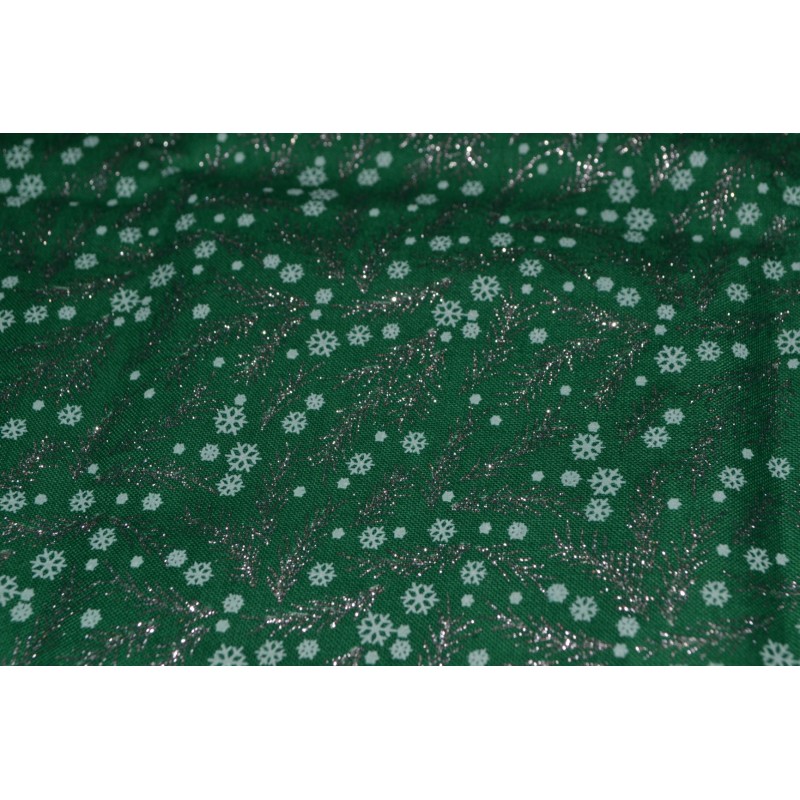 GREEN WITH silver snow flakes sold by the 1/4 yard